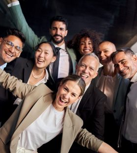 portrait-of-excited-funny-multi-ethnic-staff-peopl-2025-01-07-23-11-16-utc-e1739179475423.jpg