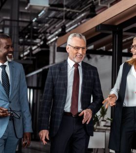 selective-focus-of-happy-businesswoman-gesturing-w-2024-11-19-04-04-24-utc.jpg